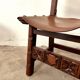 Spanish chair in leather and carved wood, 1950s/60s.