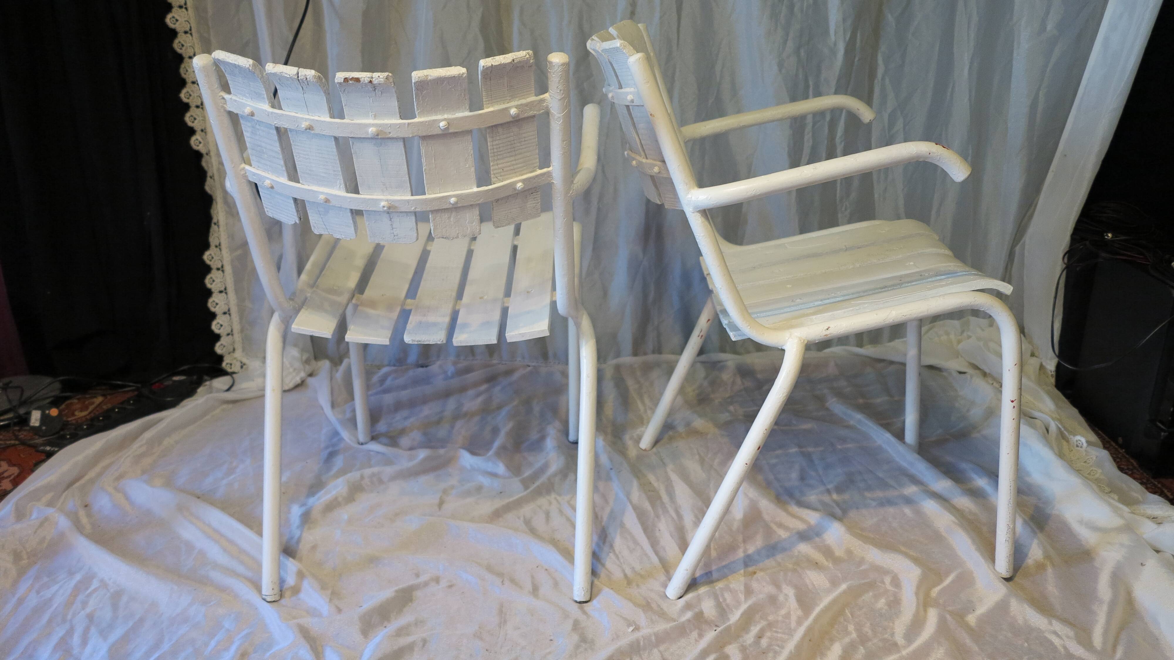 Pair of white garden armchairs