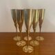 Brass champagne flutes