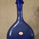 Bouteille flacon en verre teinté bleu signé Biot