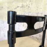 Set of six black lacquered wooden chairs.
