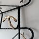 Wrought iron coat rack