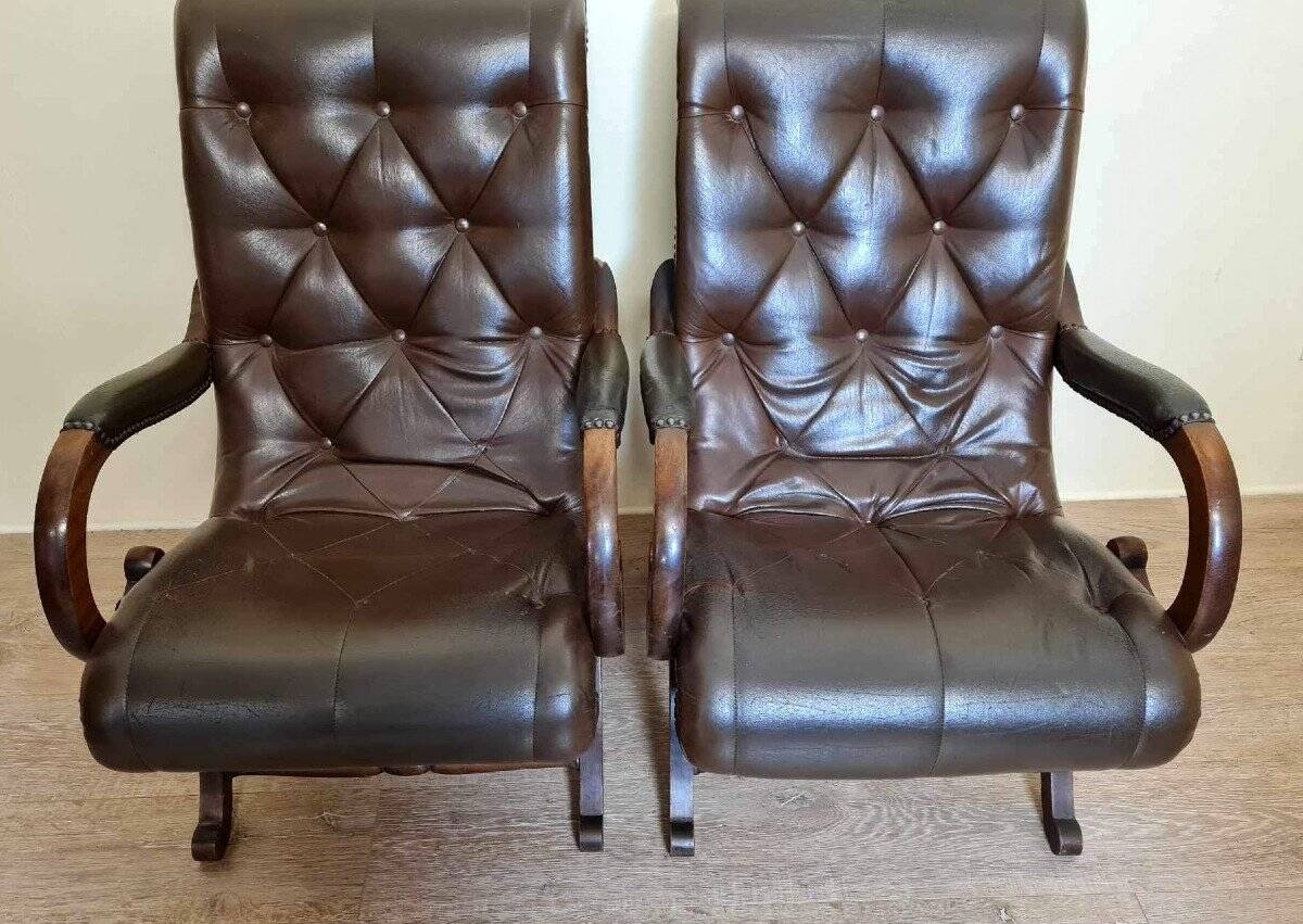 Pair of leather chesterfiel armchairs