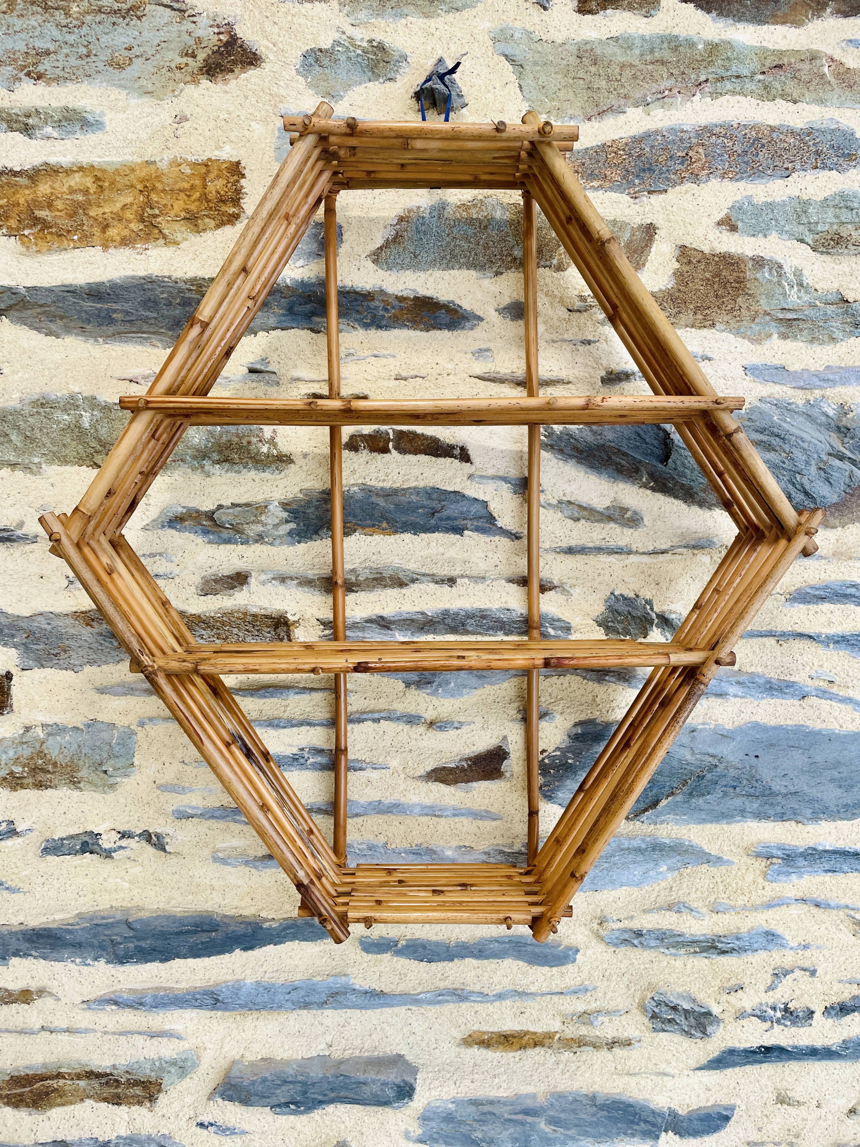 Rattan and bamboo wall shelf from the 70s