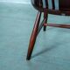 Ercol model 472 fireplace chair from the 1960s in beech.