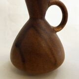 Pair of stoneware pitchers and vases