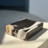 Symmetrical multicolored petrified wood soap dish