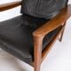 Easy chair with stool in teak upholstered with black leather design Arne Wahl Iversen