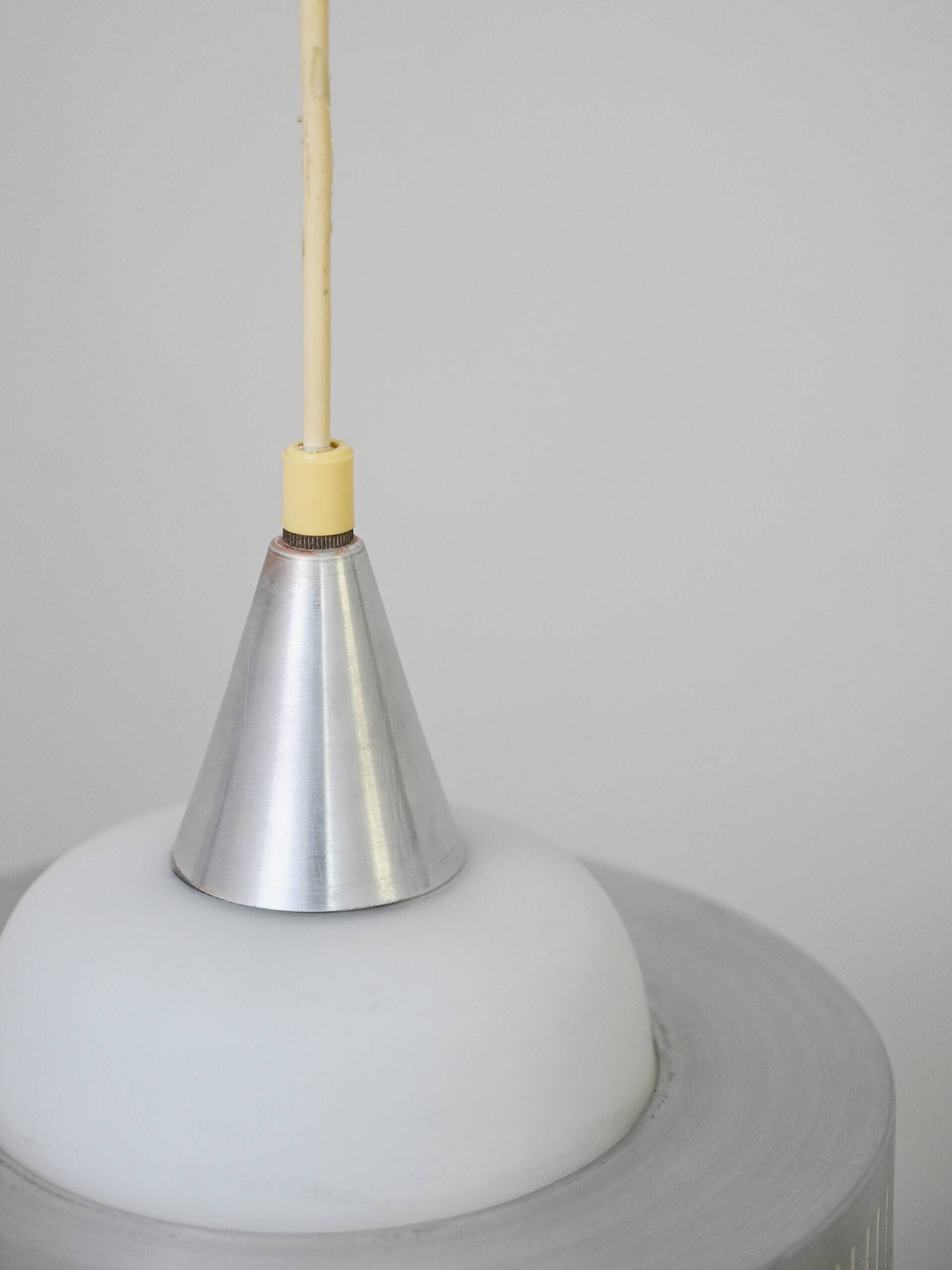 Glass and metal pendant lamps