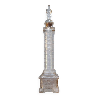 Vendôme column perfume bottle in moulded glass, 19th century.
