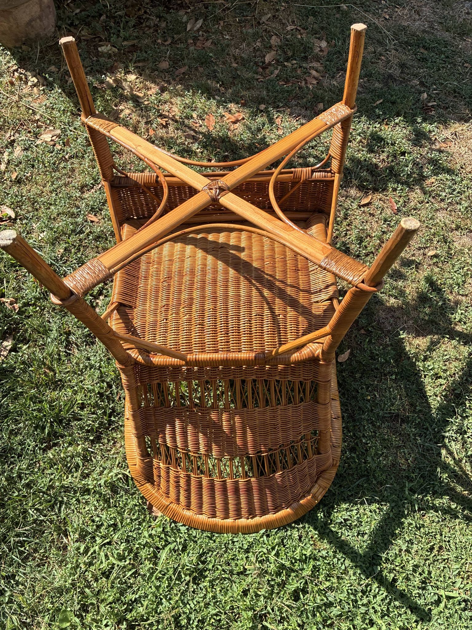 Vintage colonial lounge chair in rattan, pre-1950s.