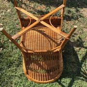 Vintage colonial lounge chair in rattan, pre-1950s.