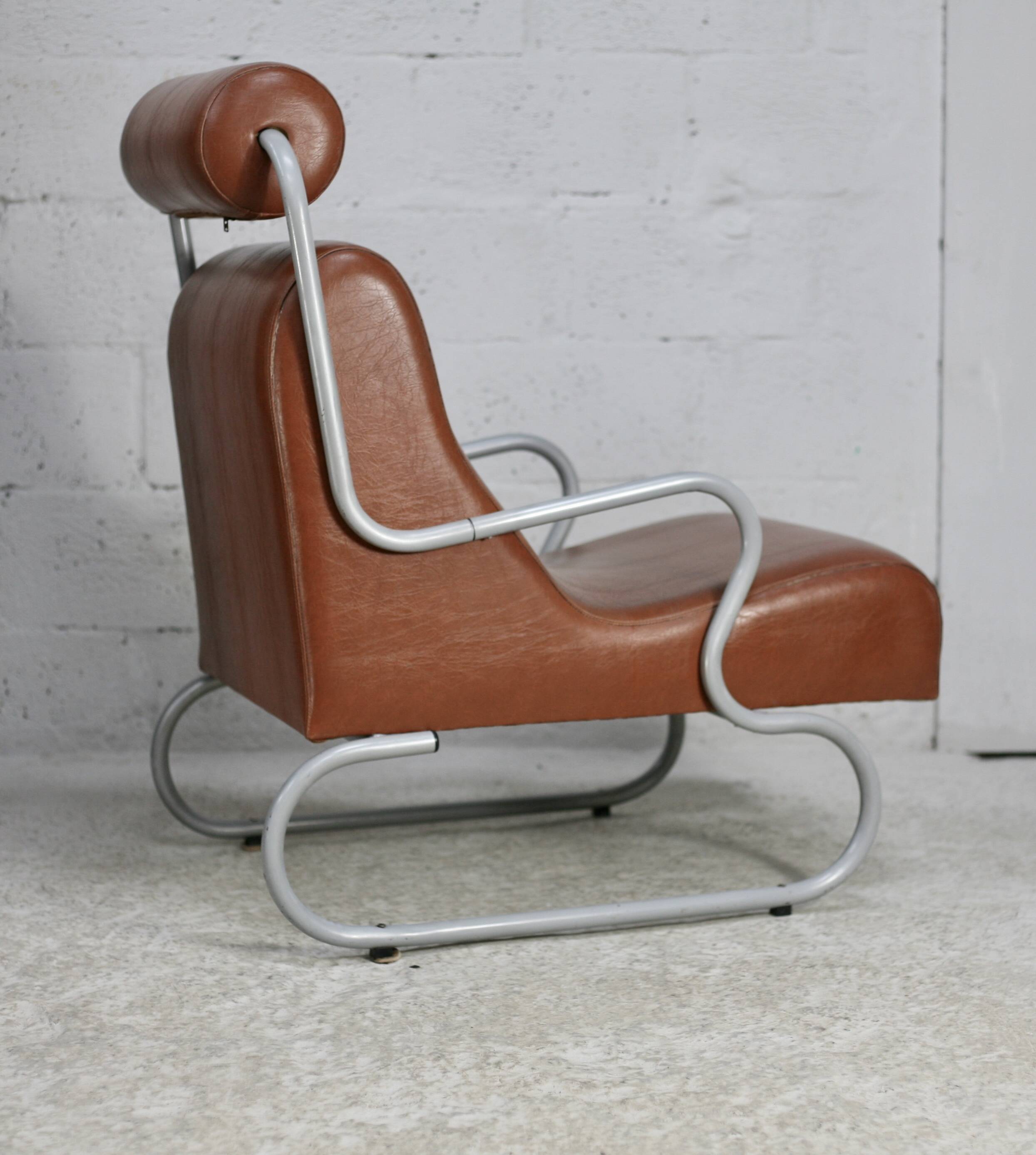 Space age armchair, metal and imitation leather. Circa 1960