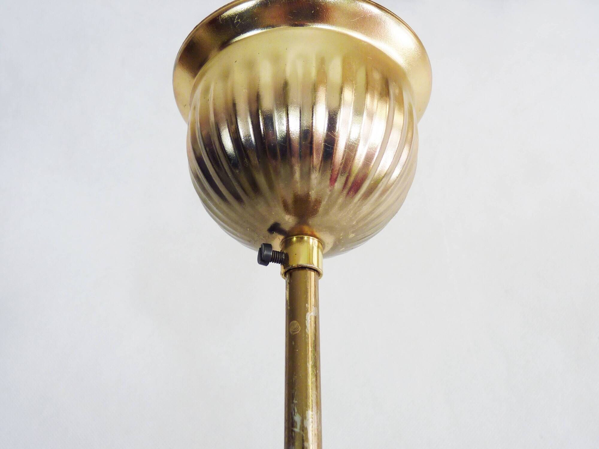 Brass and diamond-tipped chiseled glass globe hanging lamp