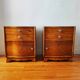 Pair of Art Deco curved bedside tables in light wood.