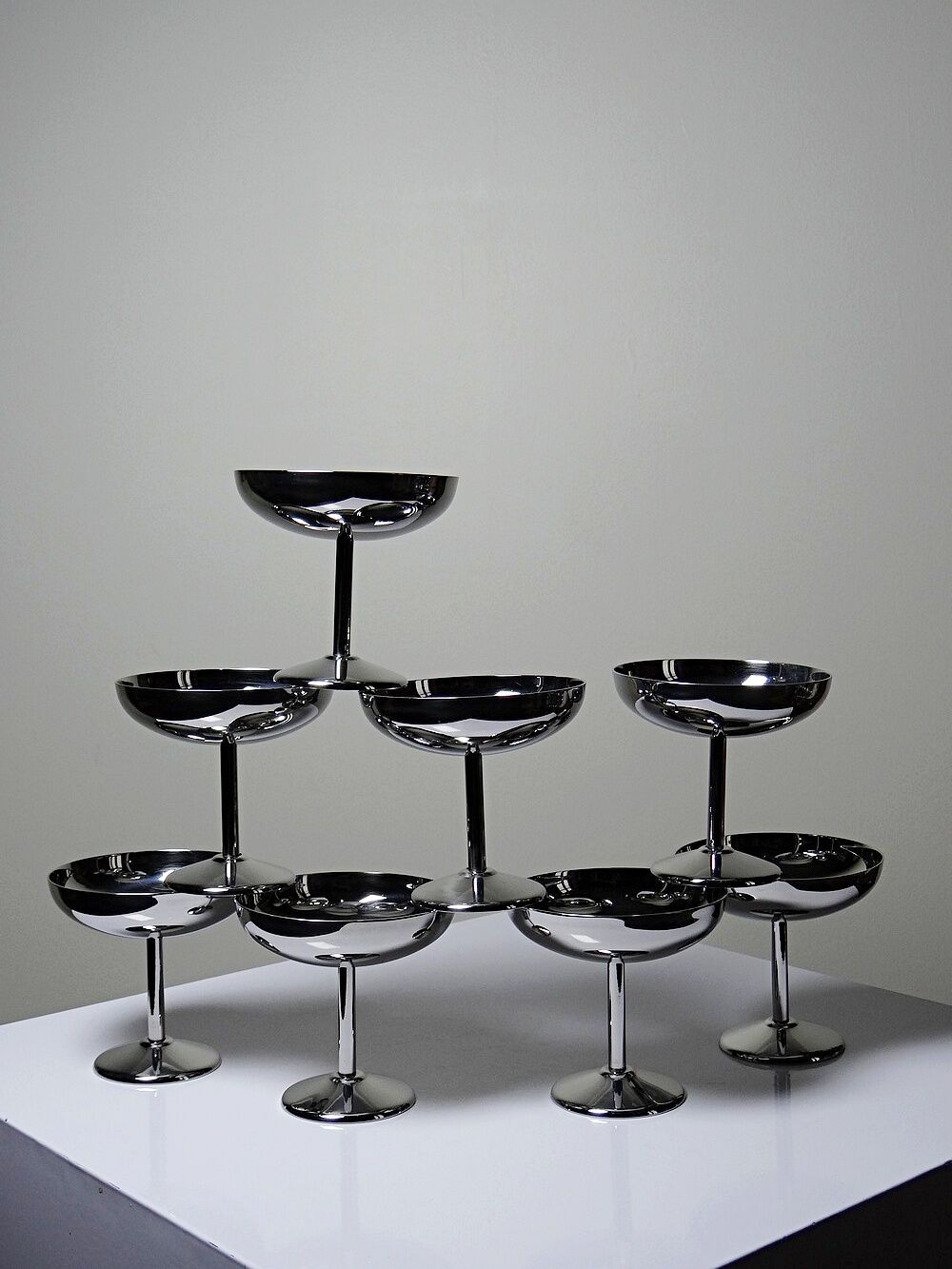 8 vintage dessert bowls on a pedestal in stainless steel in the style of Guy Degrenne.