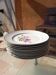 Set of 11 floral country-style plates