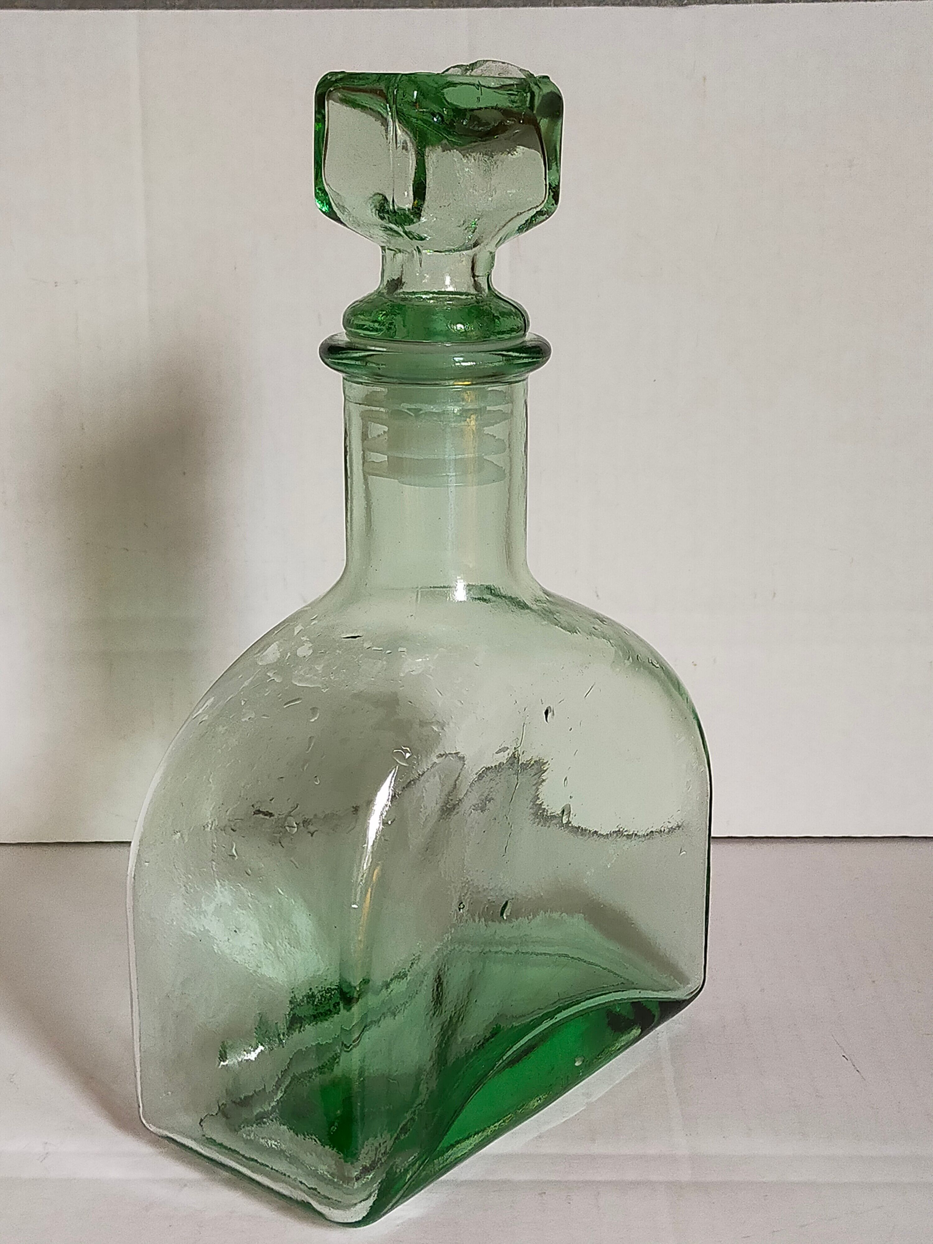 Vintage green glass whiskey decanter
