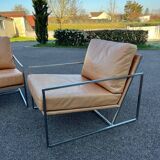Paire de fauteuils chauffeuses contemporains cuir