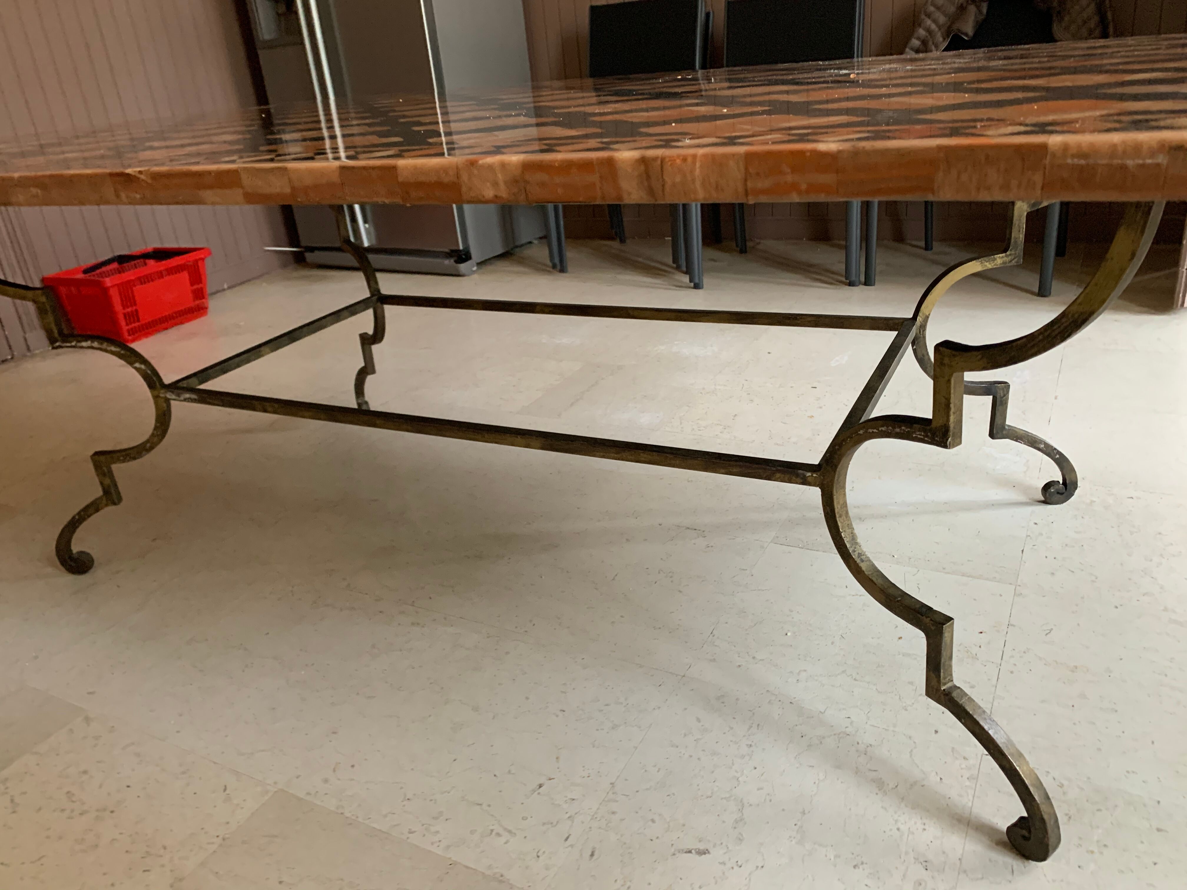 Wrought iron table on marble