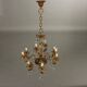 Antique Rococo-style chandelier in gilded bronze, 20th century.