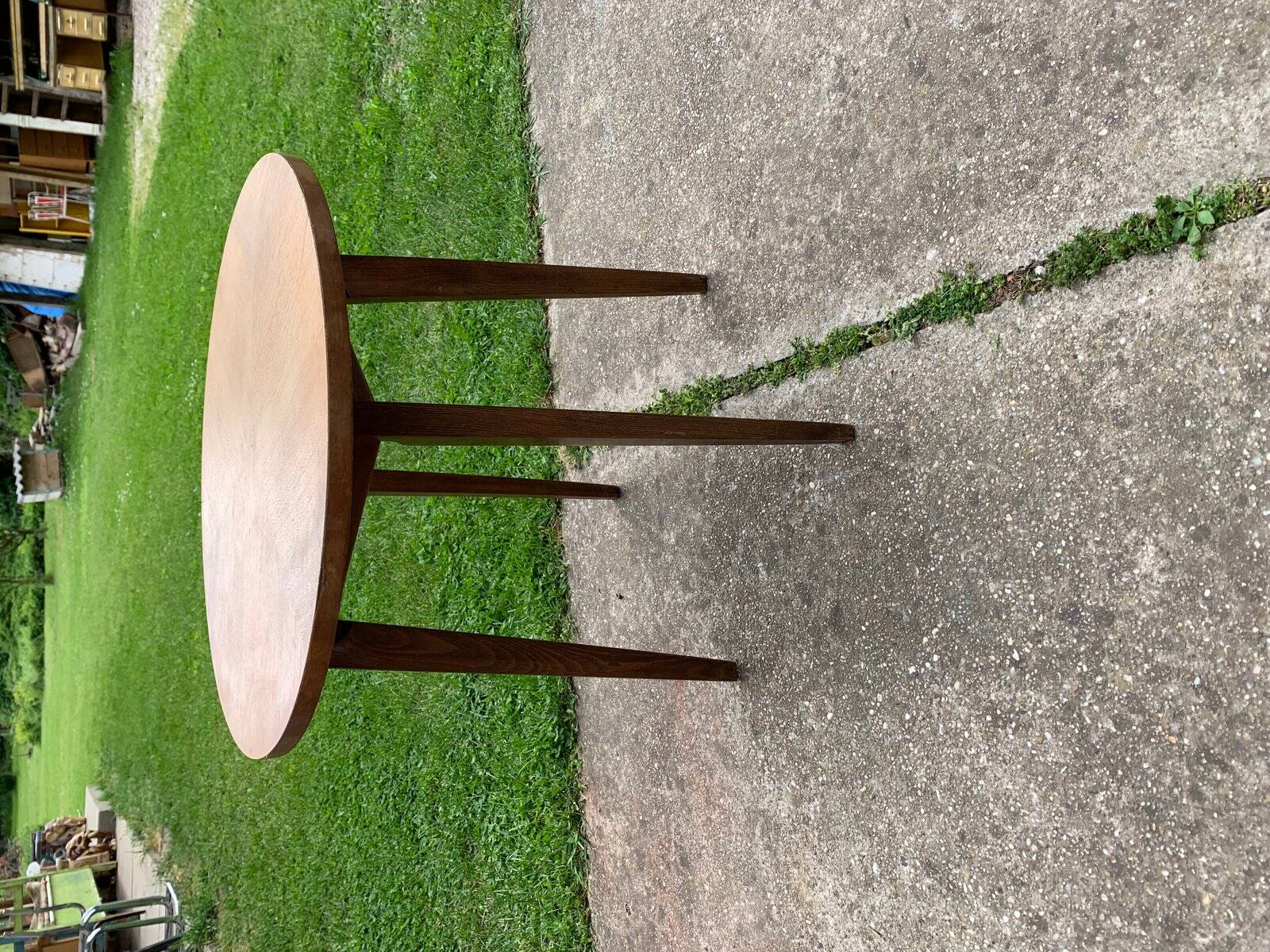 Mid-century brown side table in solid wood, 1960s tripod style.