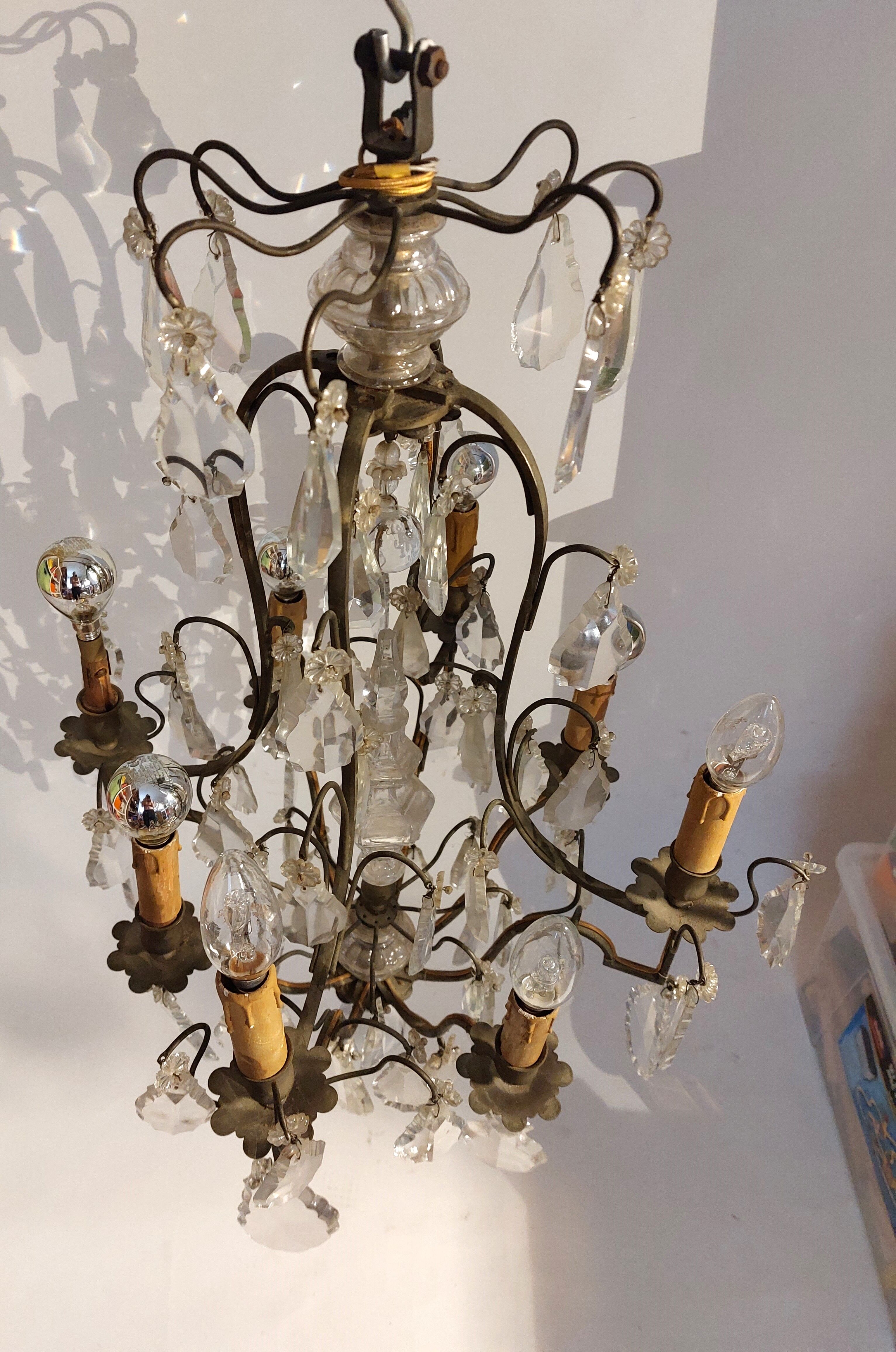 Neoclassical bronze chandelier with 8 lights, tassels and dagger