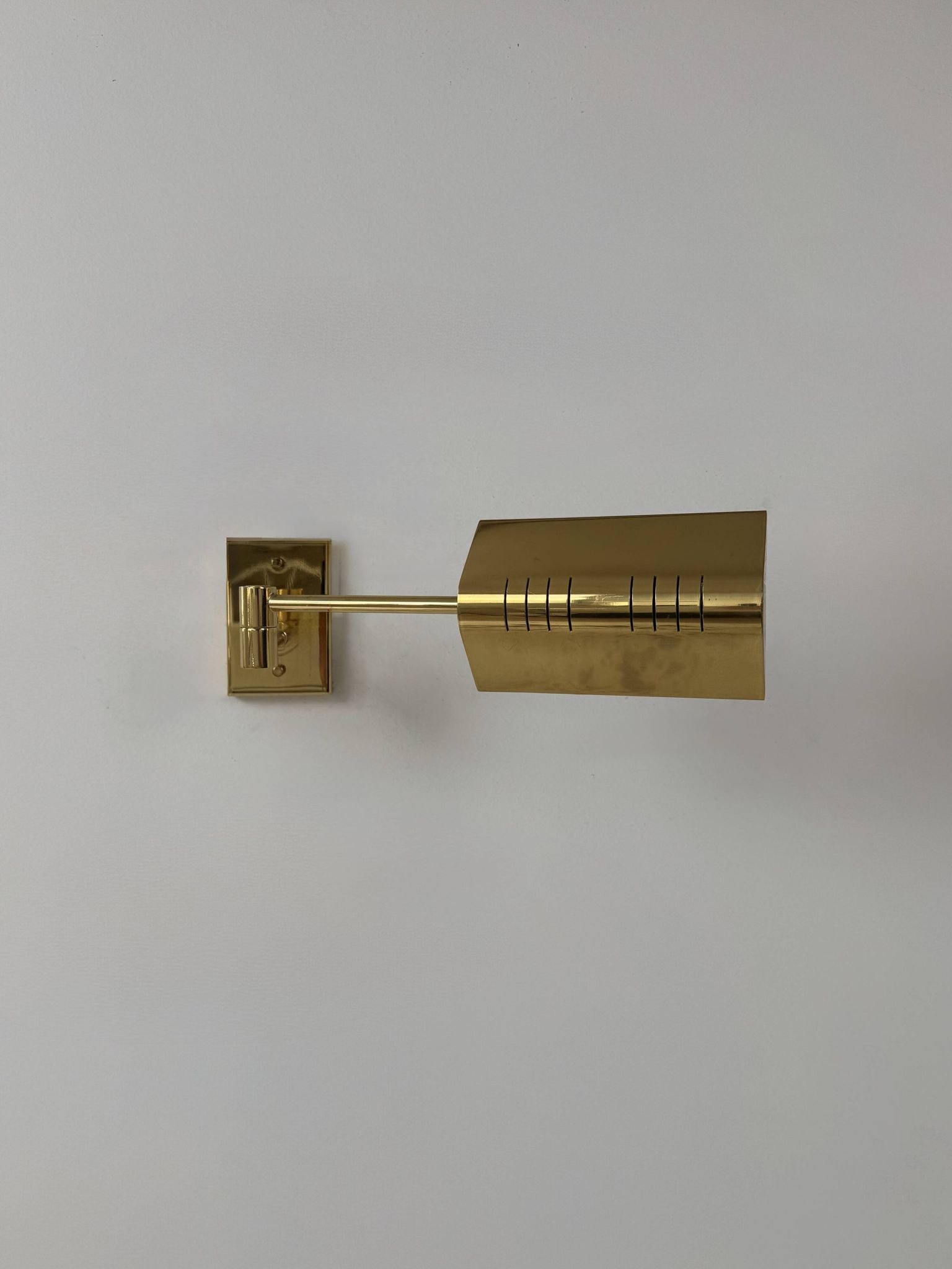 Pair of adjustable vintage wall lights, brass, France, 1970.
