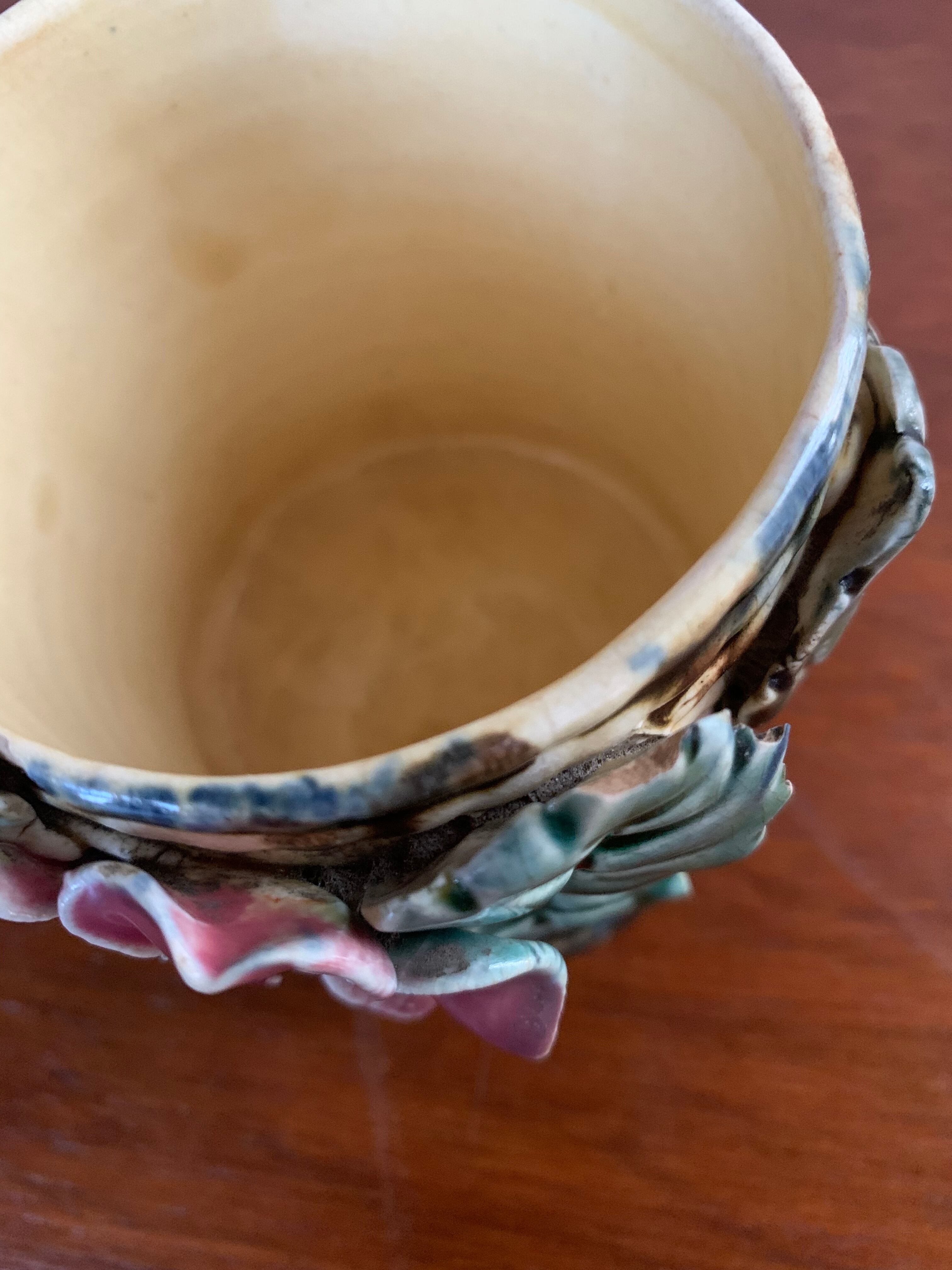 Pots in slurry flowers in relief