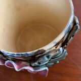 Pots in slurry flowers in relief