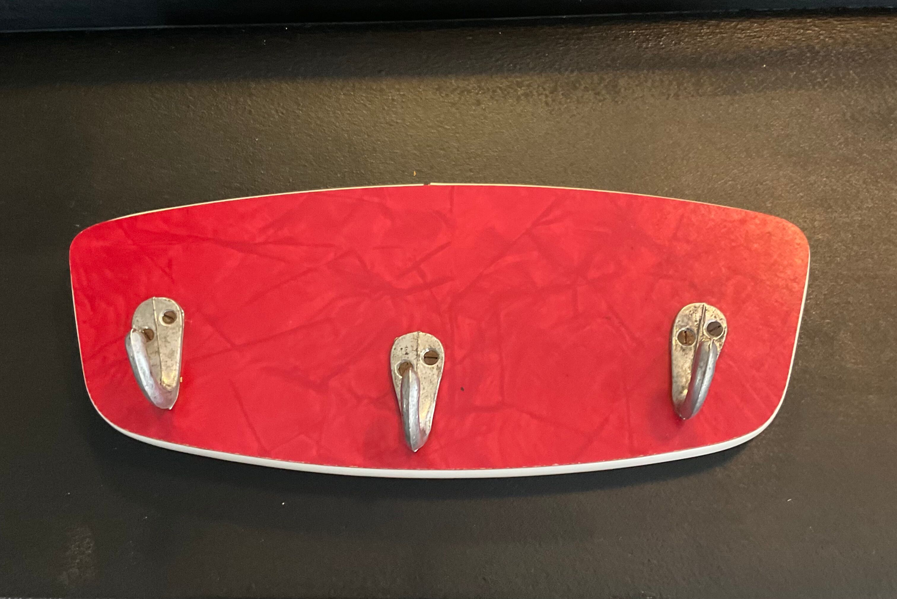 Asymmetrical coat rack of the 60s in formica