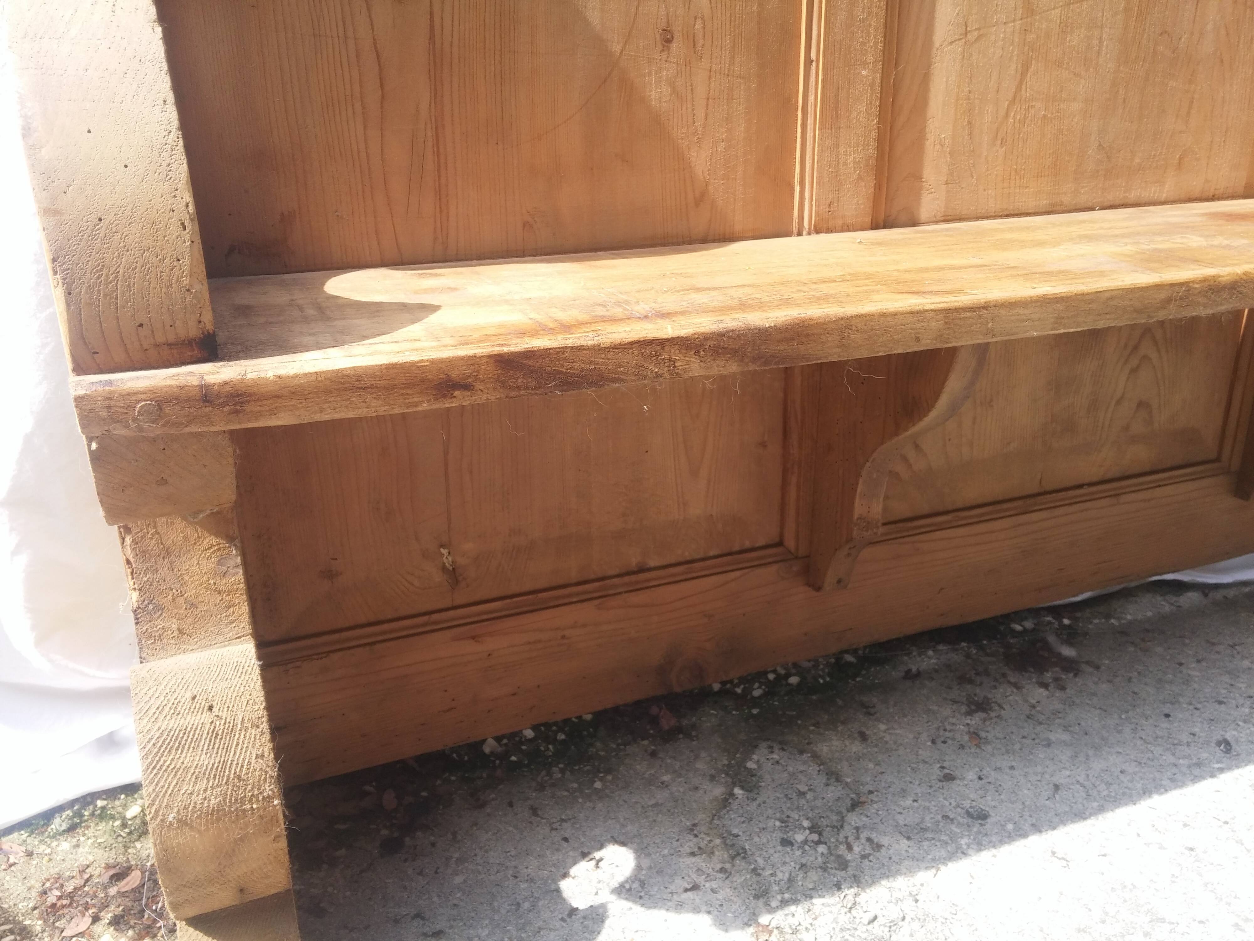 Old shabby English-style pine bench