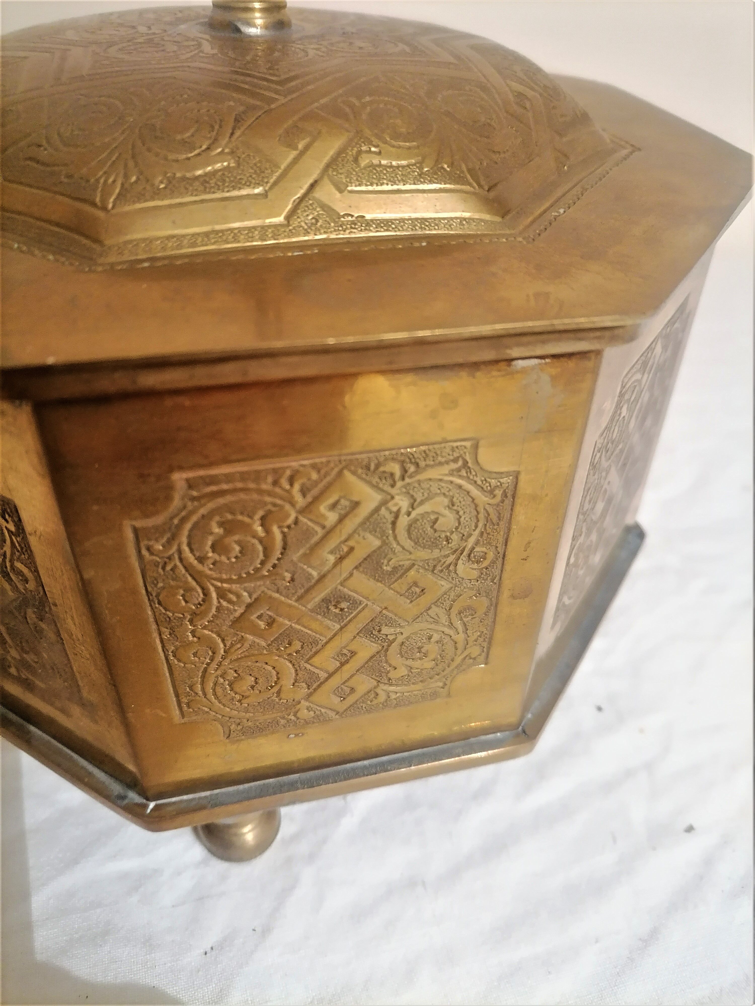 Old oriental tea box in engraved brass