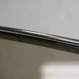 Living table. chrome metal, curved smoked glass slab, france, circa 1970.