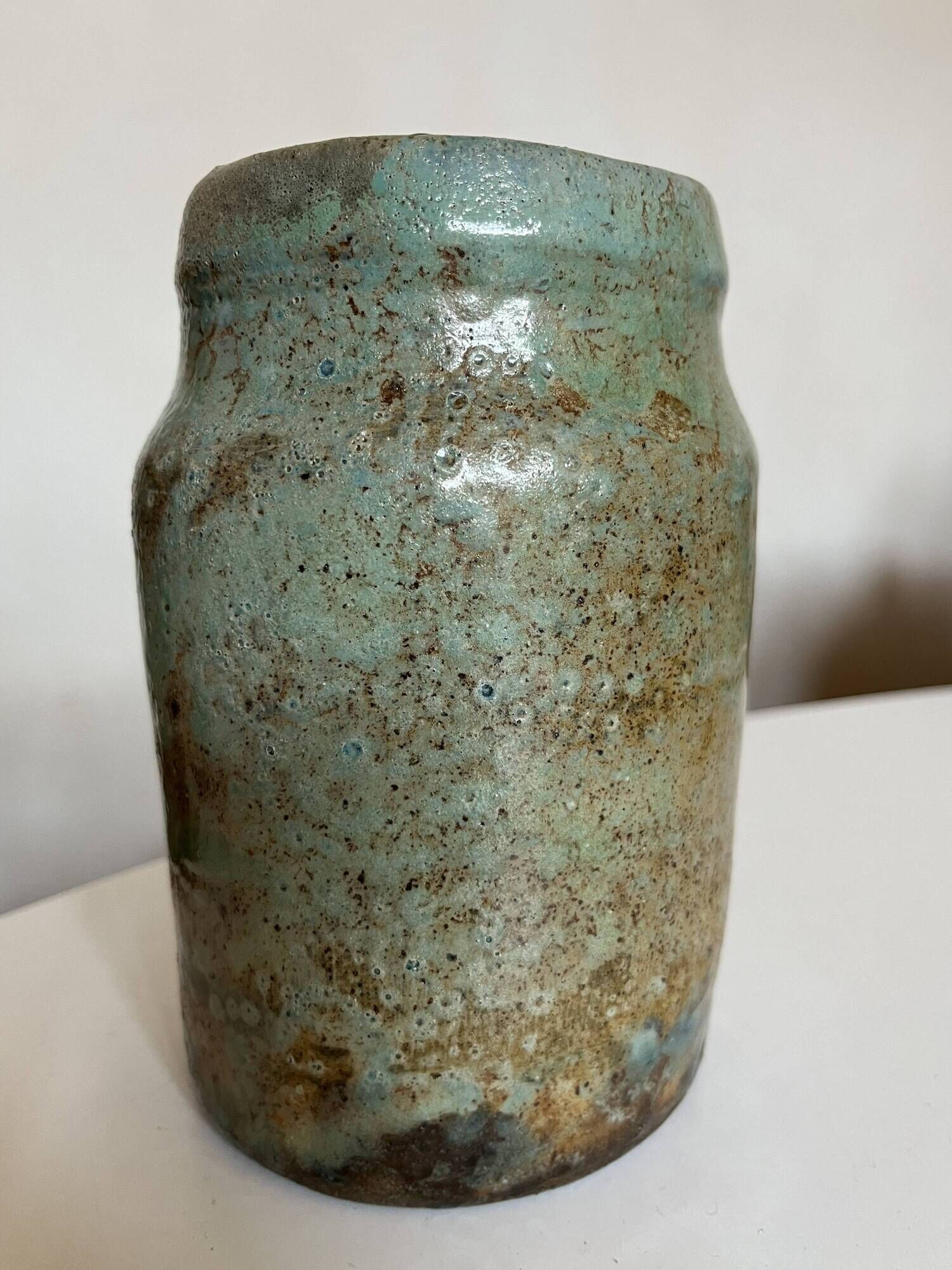 Turquoise and gilded earthenware potter's vase