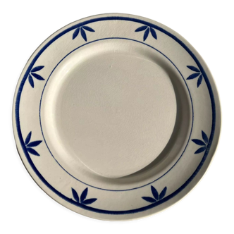 Assiette Longchamp bleue motifs de pétales stylisés