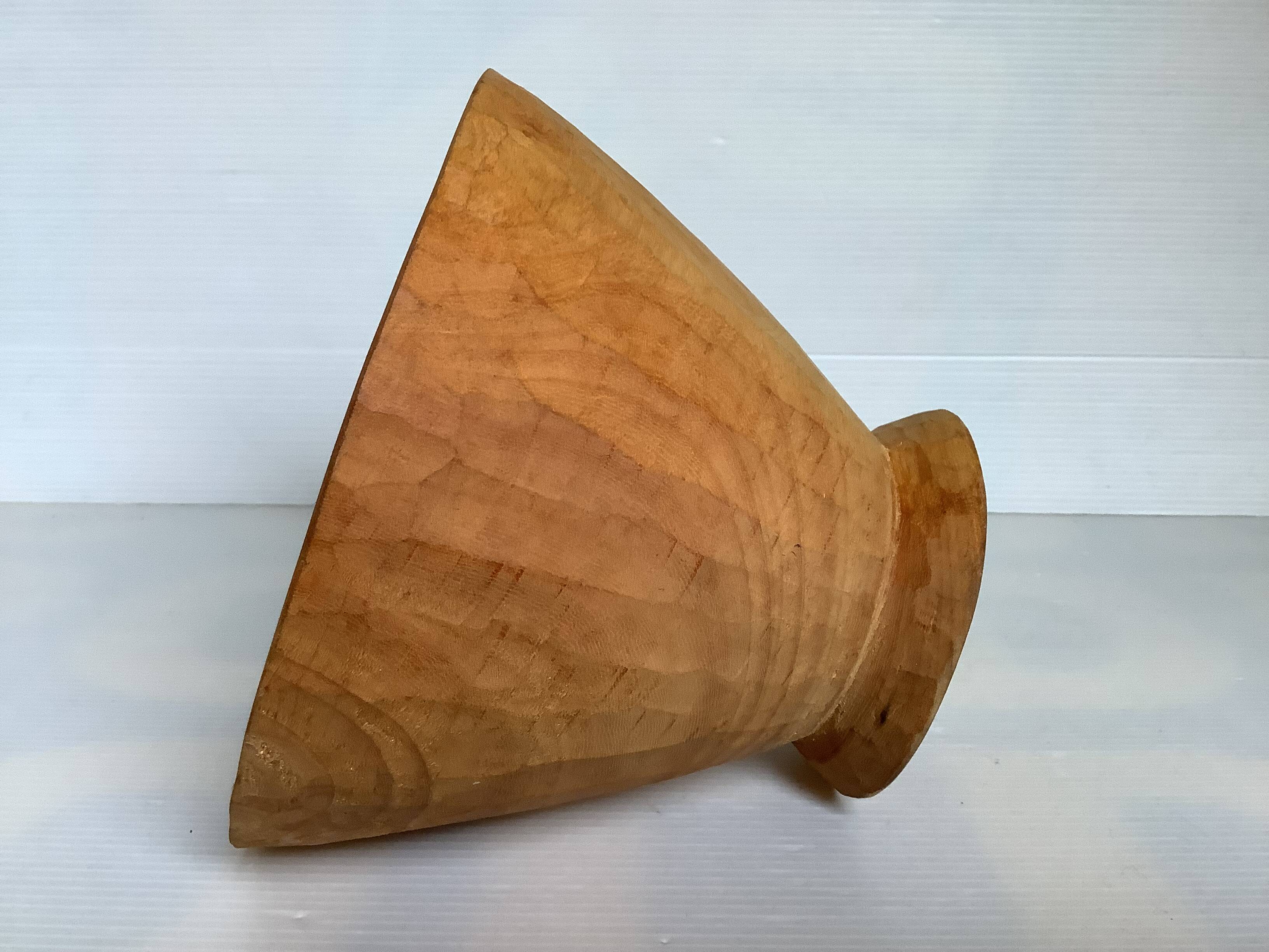 Asymmetrical wooden sculpted catchall.