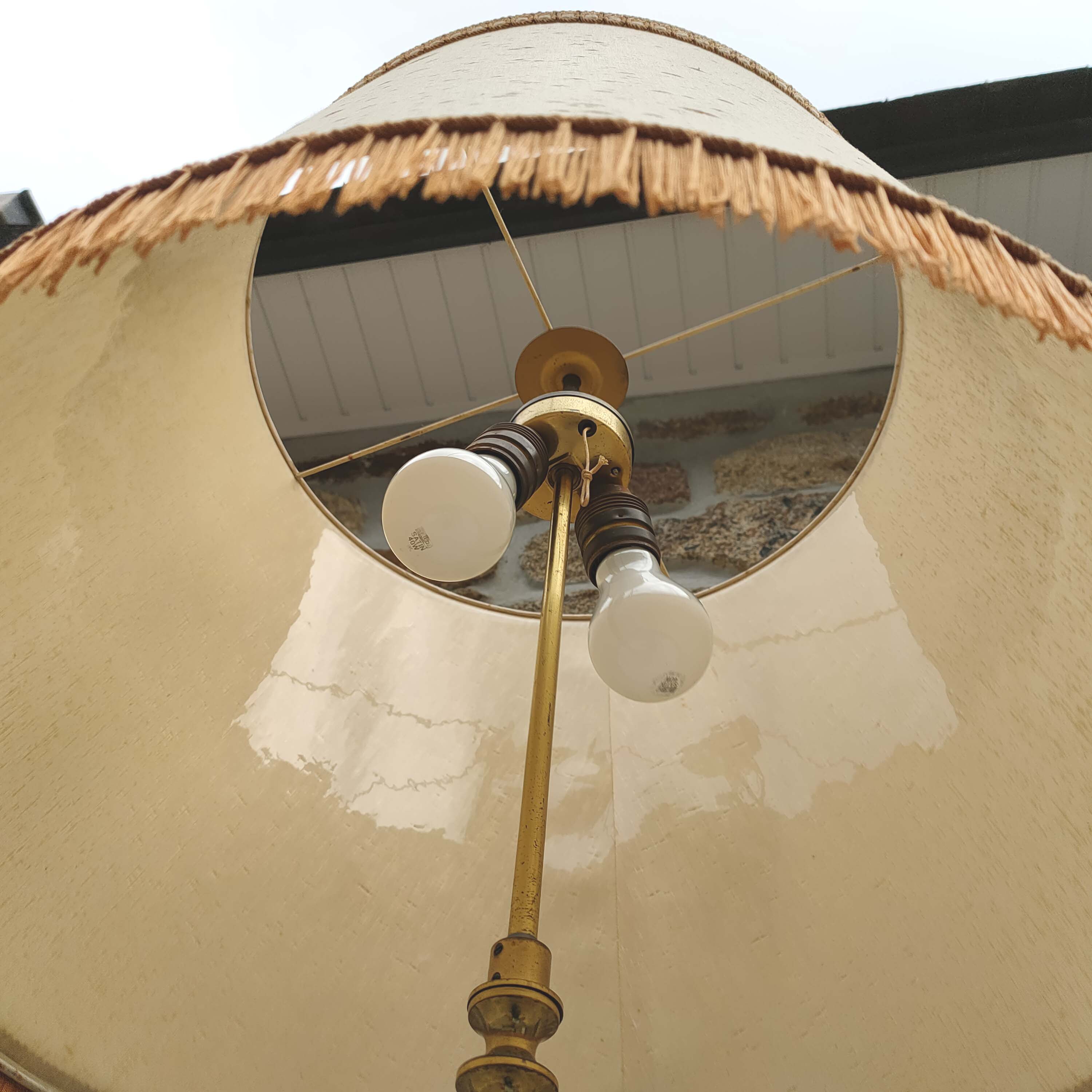 Tripod golden floor lamp