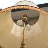 Tripod golden floor lamp