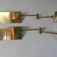 Pair of adjustable brass wall lamps after koch & lowy