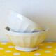 2 antique faceted bowls in cracked earthenware