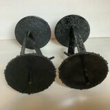 Pair of black metal candlesticks