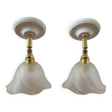 Pair of wall sconces with vintage globes