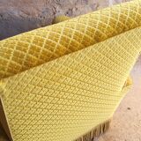 Mustard velvet fringed armchair