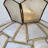 Suspension in mother-of-pearl and brass