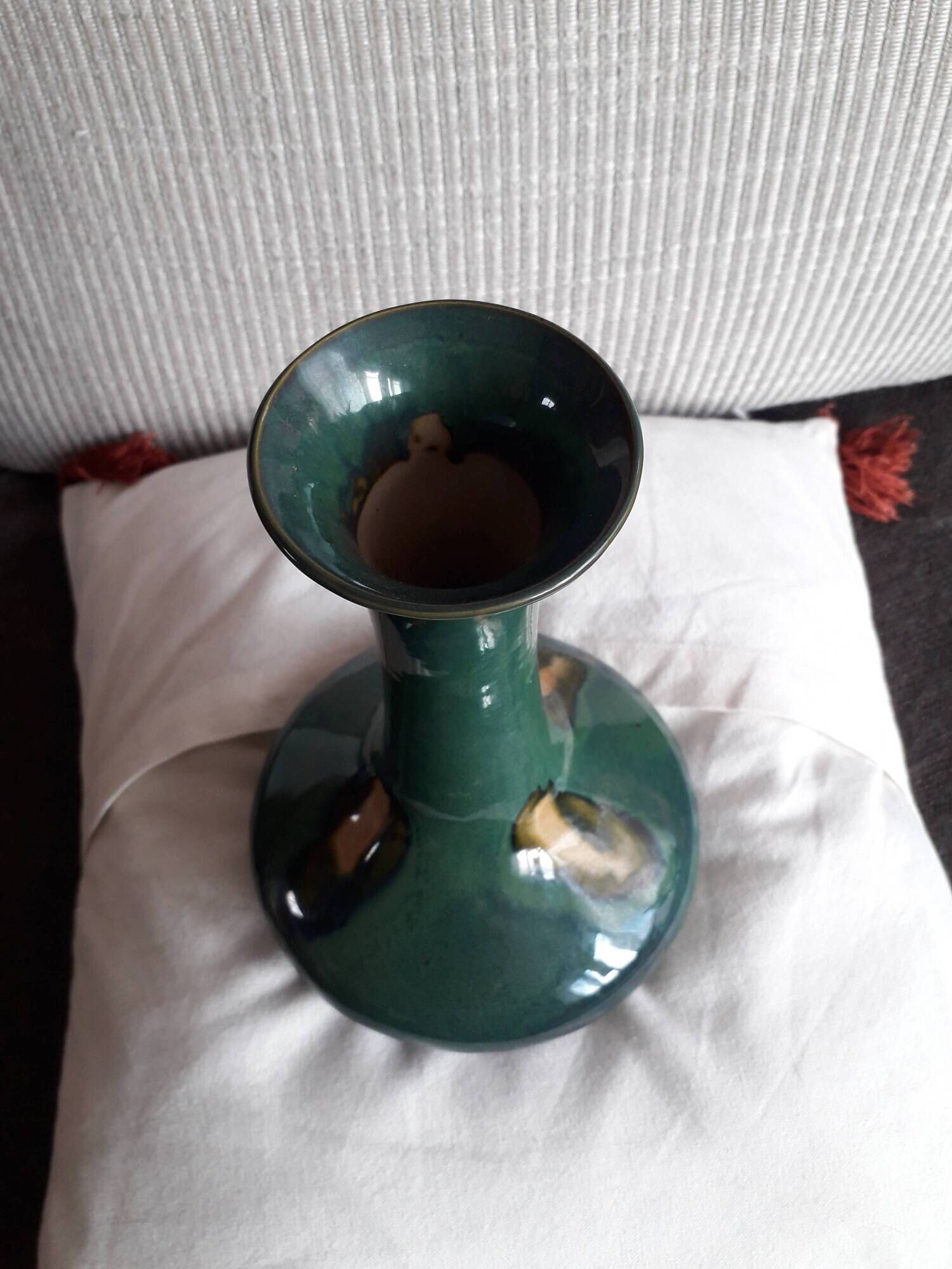 Vintage ceramic vase with a very original design.