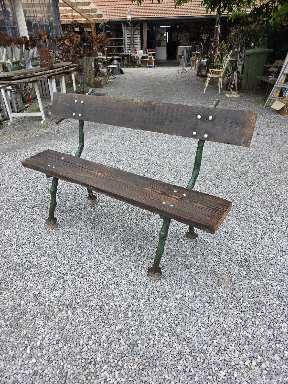 Cast iron garden bench with solid oak seat