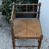 Chaise d’angle ancienne en bois façon bambou assise en paille