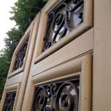 Porte d'entrée cintrée double en chêne, grilles et verre, XIXème