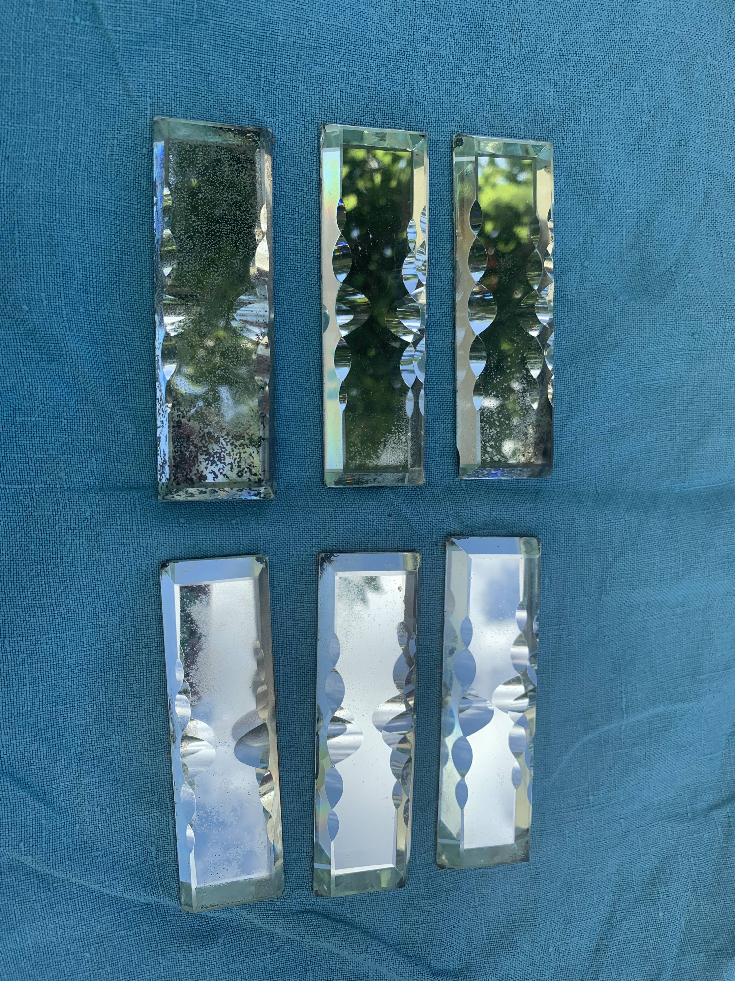 6 knife holders and a bottle bottom, glass, beveled mirror